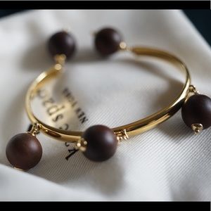 SOLD unique Kate Spade bangle with wooden charms